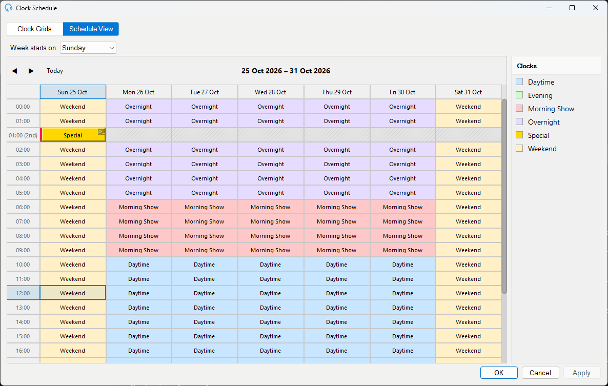 The Schedule View on a fall-back day showing the repeated 01:00 hour with a (2nd) override